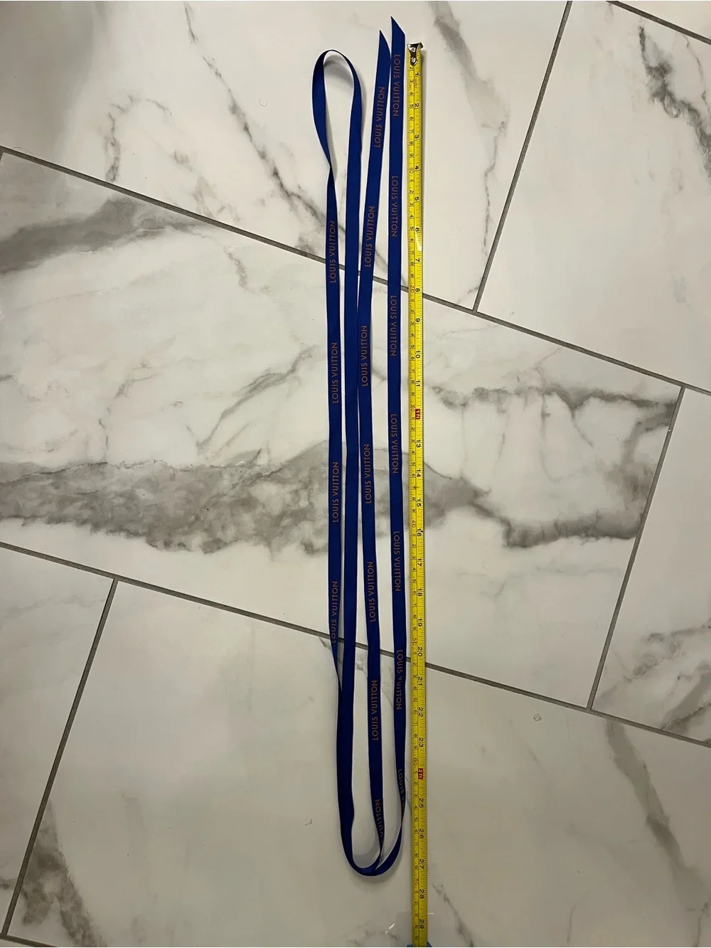 Louis Vuitton cobalt blue ribbon with orange logo